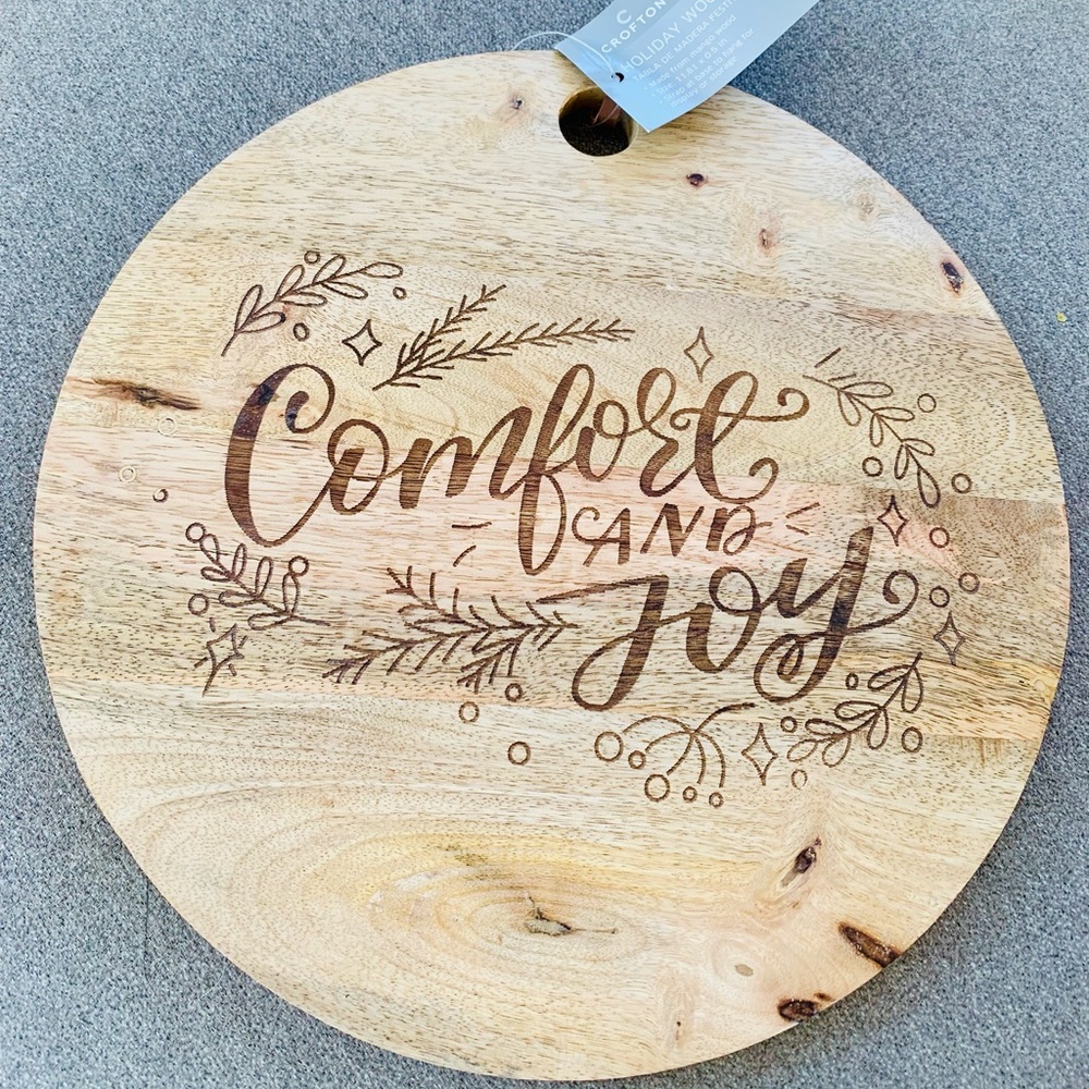 Crofton Comfort and Joy Mango wood holiday charcuterie board with display tag